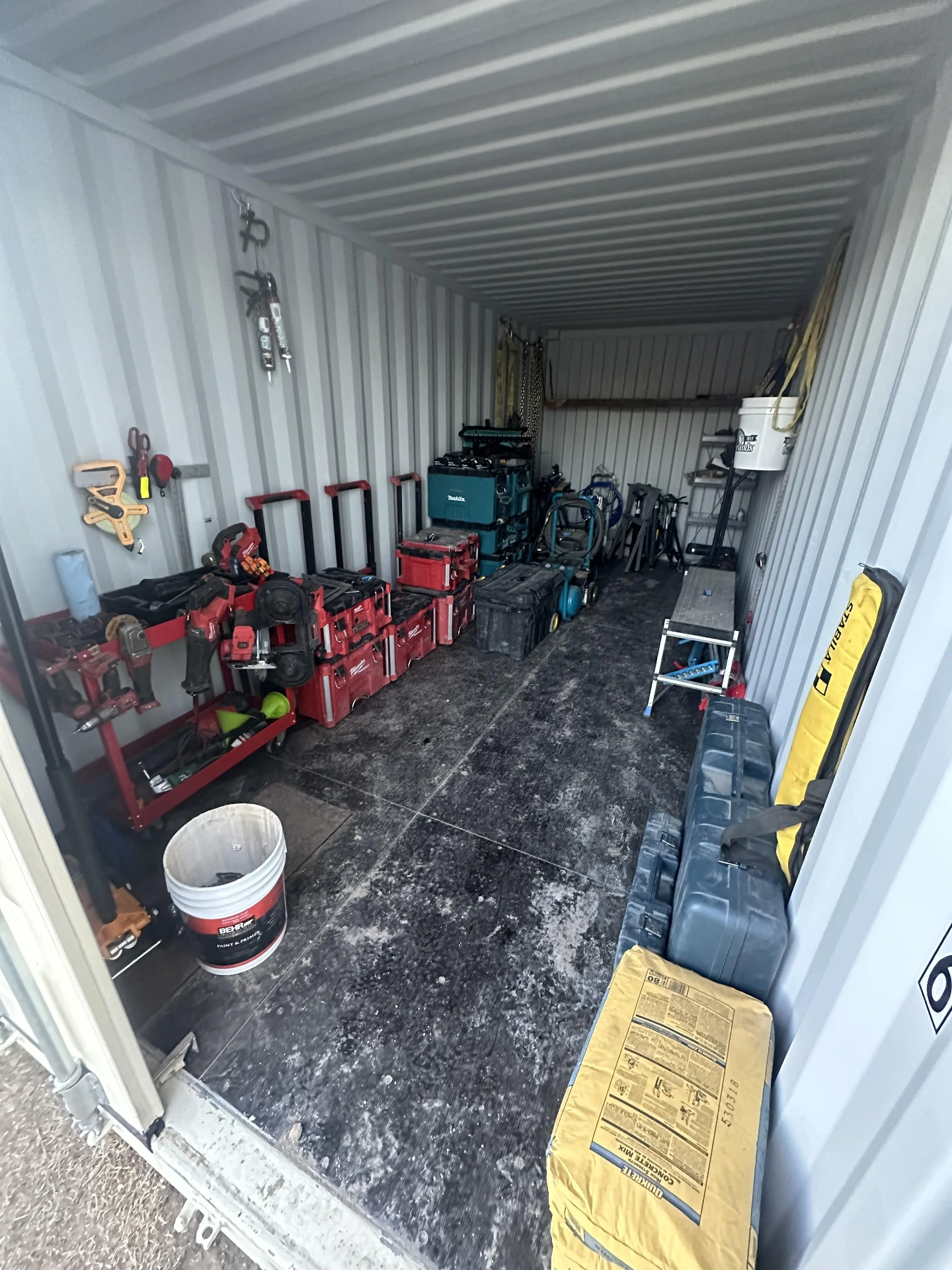 Business storage warehouse with shelves and pallets