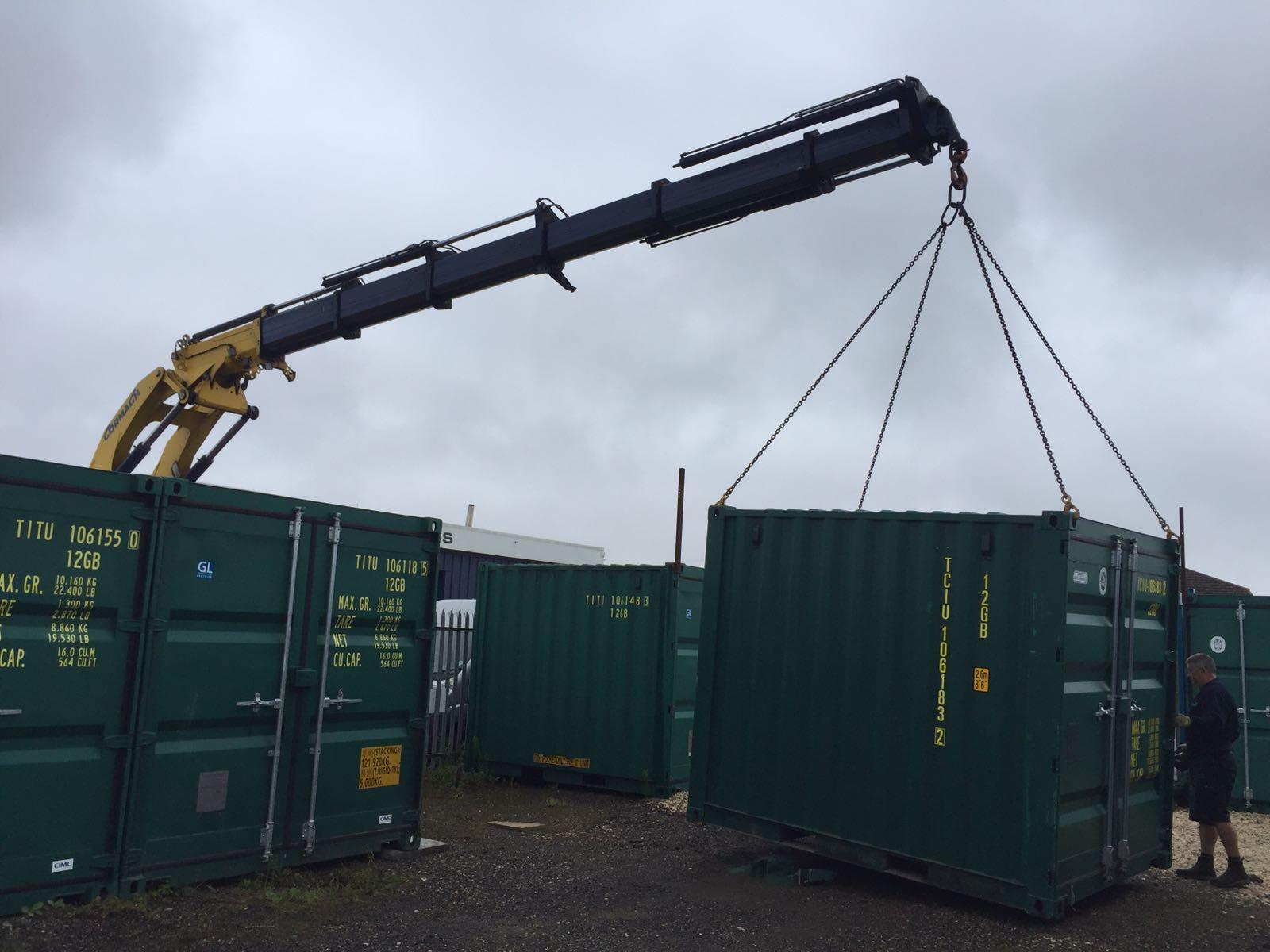 Storage container delivery by crane at Cambridge facility